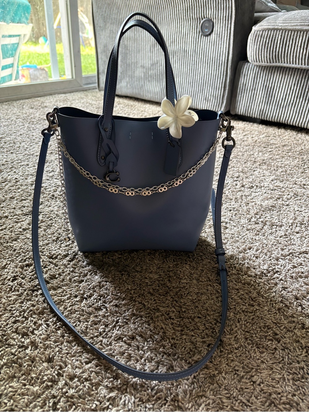 Blue leather coach bag with gun metal hardware